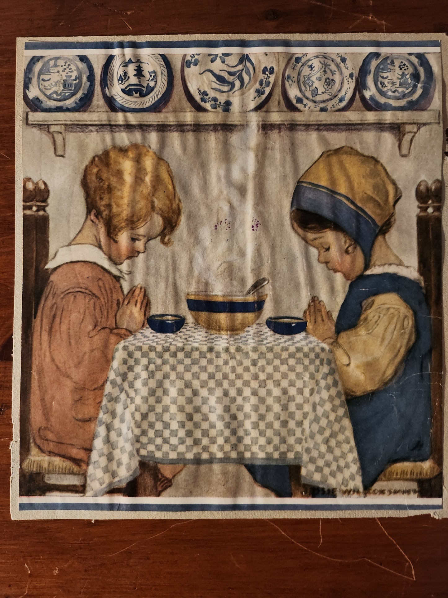 Vintage illustration with two girls sitting at a table by Jessie Wilcox Smith