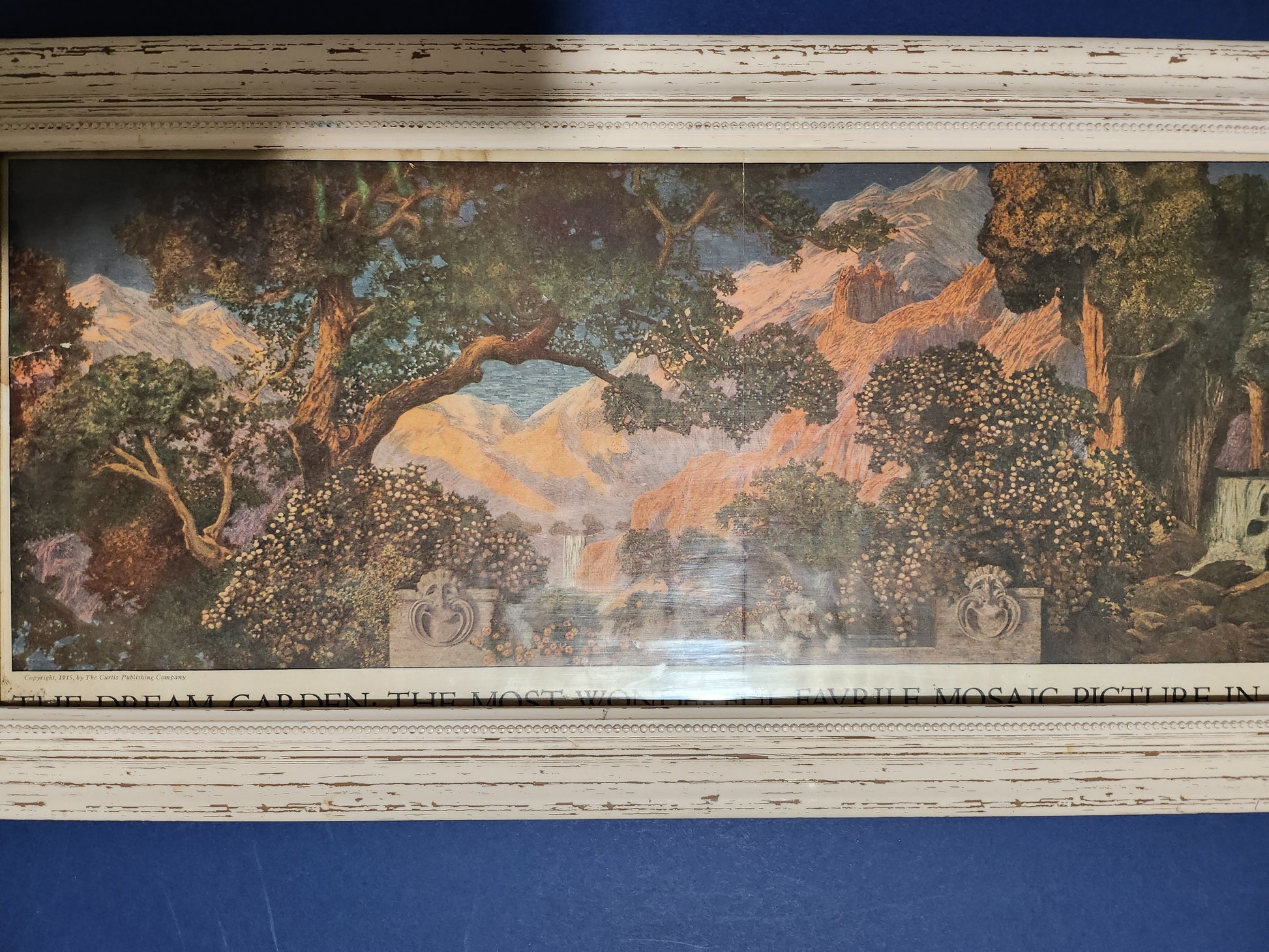 Close-up image of Maxfield Parrish's 'Dream Garden' - featuring a depiction of the garden at his estate with Mount Ascutney in the background