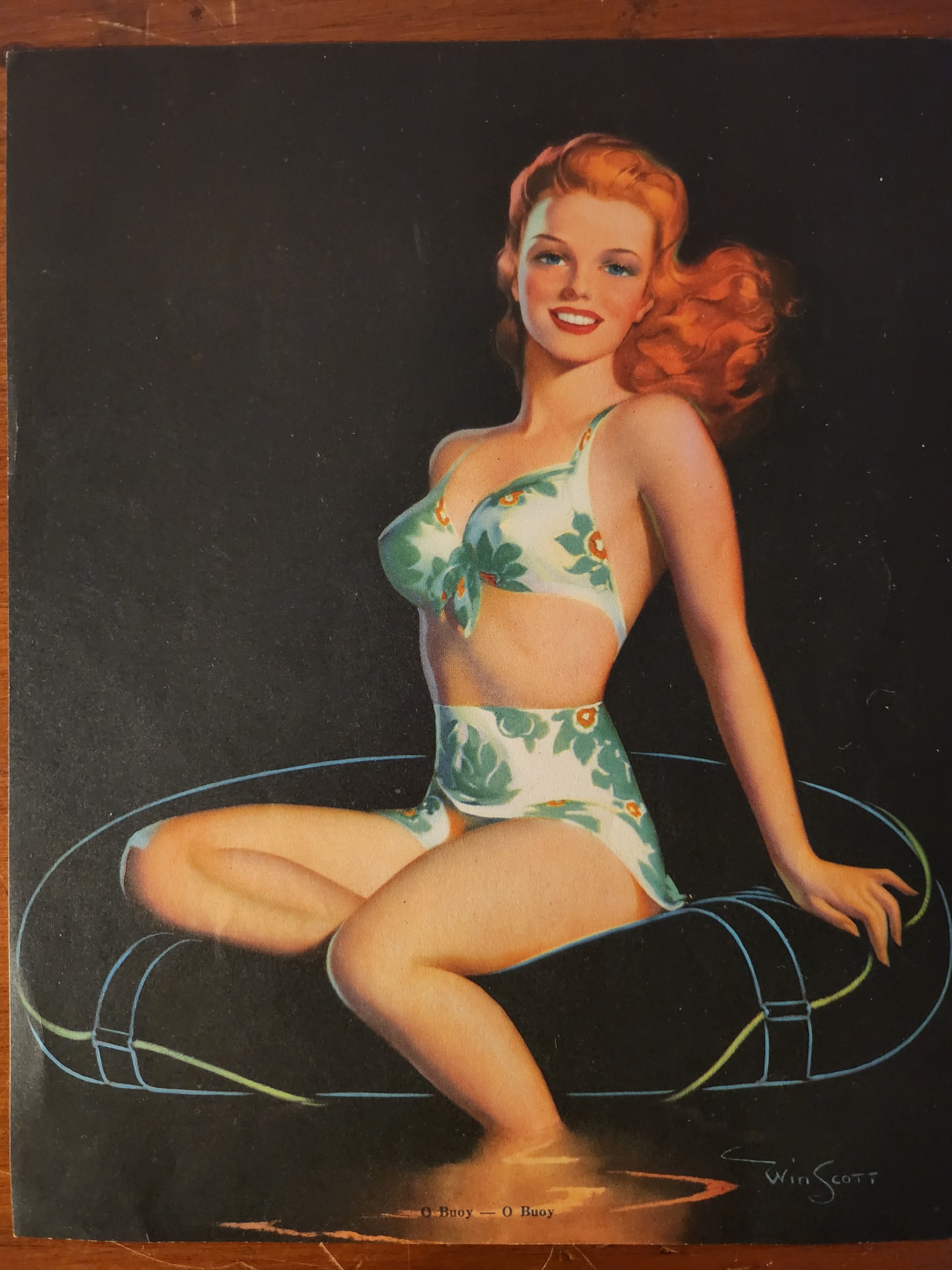 Pin-up model illustration of a woman in a floral swimsuit on a dark background 