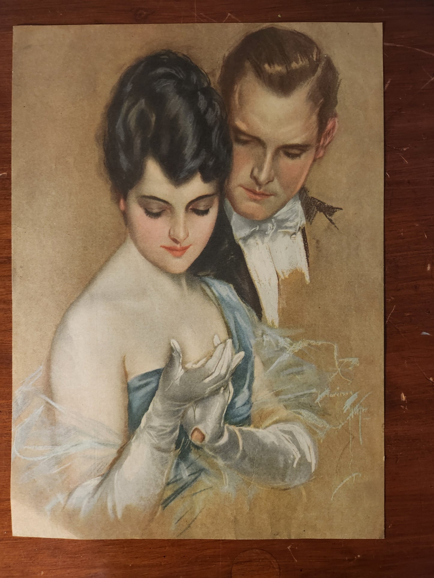 Vintage Harrison Fisher illustration of a man and woman in formal wear at a gala